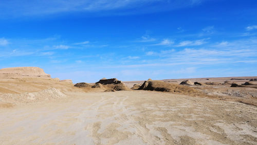 Panoramic view of desert against sky