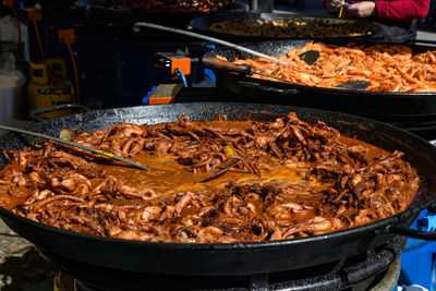 Close-up of meat in cooking pan