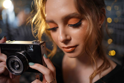 Girl with retro photo camera