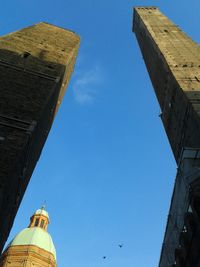 Low angle view of building against blue sky