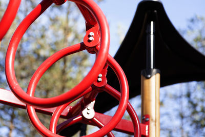 Low angle view of red slide in park