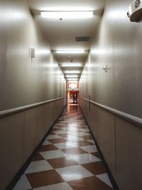 Illuminated corridor of building