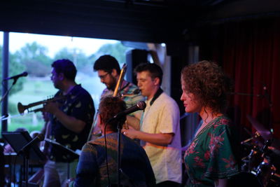 Group of people playing guitar