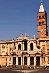 Low angle view of building against blue sky