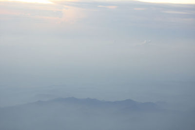 Scenic view of mountains against sky during sunset