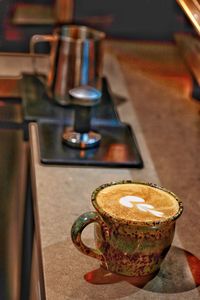 Close-up of coffee served on table