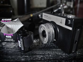 Close-up of camera on table