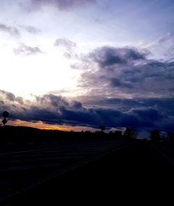 Scenic view of silhouette landscape against sky during sunset