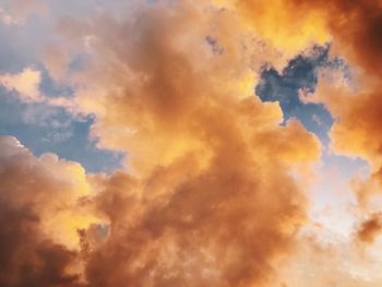 Low angle view of dramatic sky during sunset