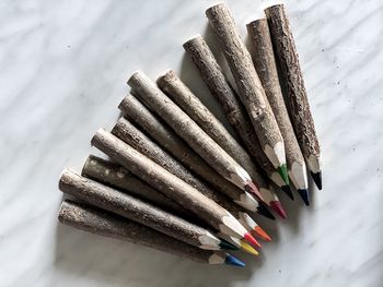 High angle view of colored pencils on table