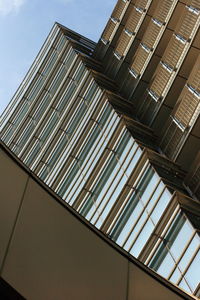 Low angle view of modern building against clear sky