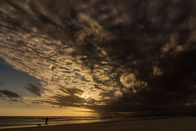 Scenic view of sea against sky at sunset