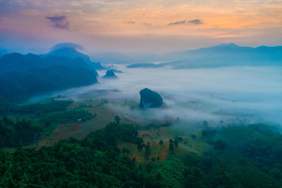 Scenic view of mountains against sky during sunset