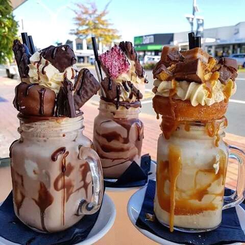 CLOSE-UP OF ICE CREAM SERVED ON TABLE