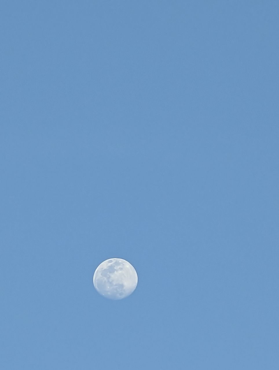 moon, sky, space, blue, astronomy, clear sky, copy space, no people, beauty in nature, low angle view, nature, tranquility, full moon, scenics - nature, planetary moon, night, tranquil scene, outdoors, astrology, idyllic, circle, moon surface, geometric shape, discovery, astronomical object, space exploration, cloud, exploration