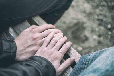 Low section of man on hand