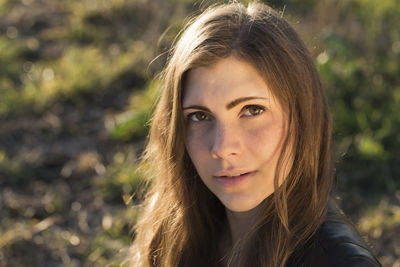 Close-up portrait of young woman