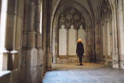 Rear view of woman in church