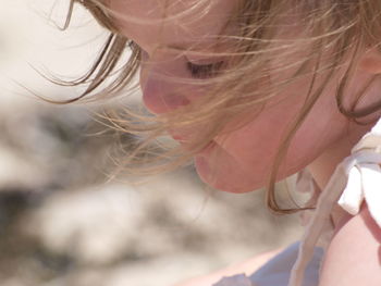 Close-up of girl wearing hat