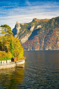 Scenic view of lake against sky during autumn
