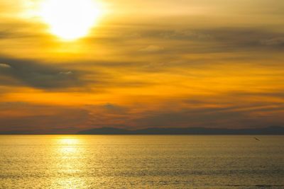 Scenic view of sea against dramatic sky