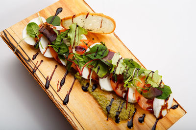 High angle view of chopped vegetables on cutting board