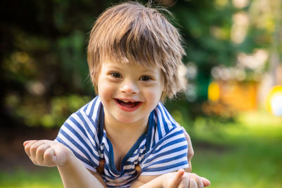 Portrait of cute boy smiling