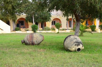 Stone sculpture on field in park