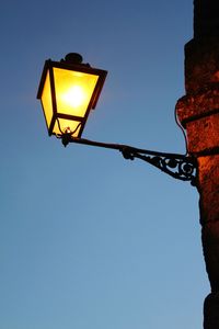 Low angle view of street light against clear sky