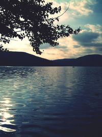 Scenic view of lake at sunset