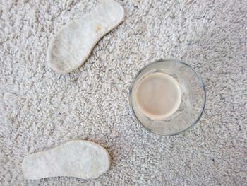 High angle view of coffee on carpet