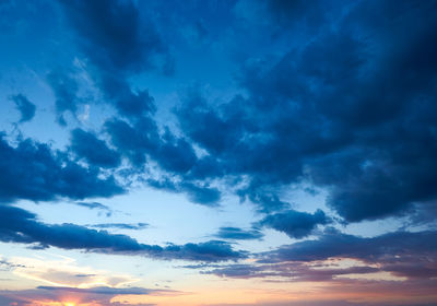 Low angle view of clouds in sky during sunset