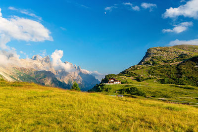 Very beautiful view of the evening mountains pale di san martino village with dolomite peaks 