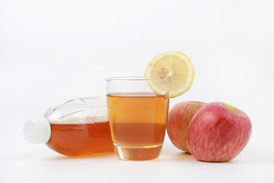 Close-up of drink against white background