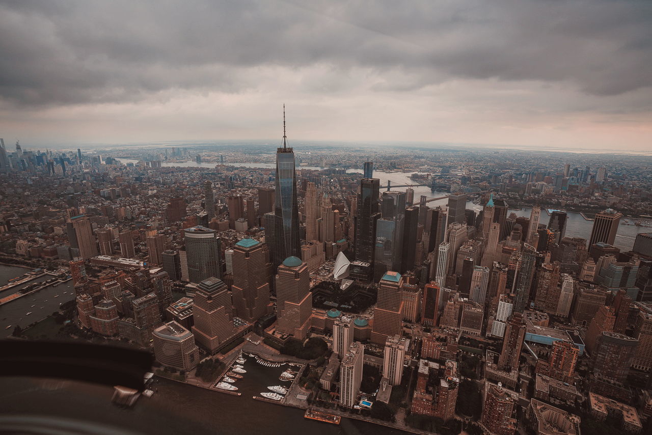 building exterior, built structure, cityscape, city, architecture, sky, building, cloud - sky, skyscraper, office building exterior, tower, crowd, residential district, tall - high, crowded, nature, travel destinations, landscape, modern, outdoors, financial district, spire