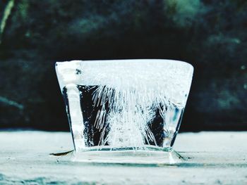 Close-up of water splashing in container