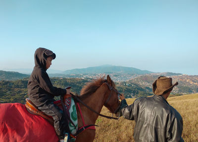 Man riding horse