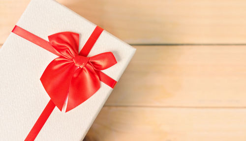 High angle view of gift on wooden table