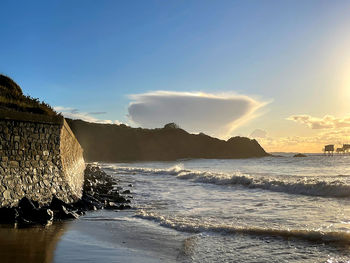 Scenic view of sea against sky during sunset