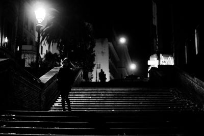 Illuminated street light at night