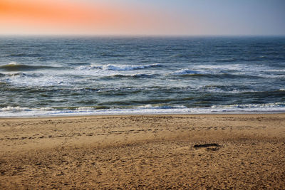 Scenic view of sea against clear sky