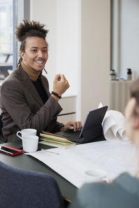 Smiling man in office