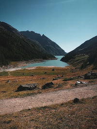 Scenic view of landscape and mountains against sky