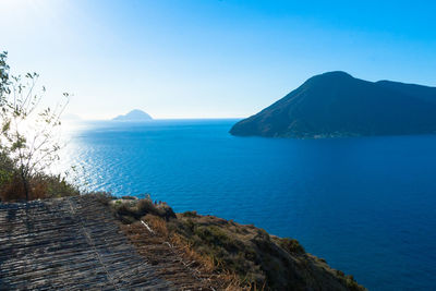 Scenic view of sea against blue sky