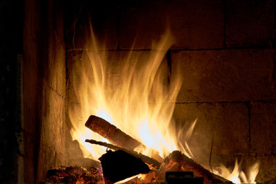 Close-up of fire burning at night