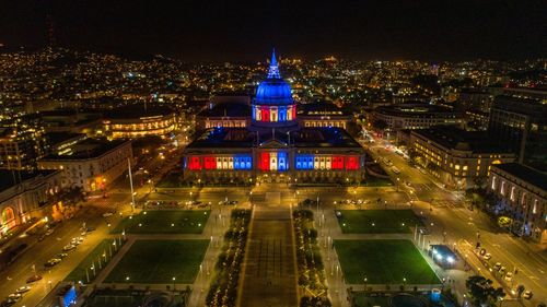 High angle view of illuminated courthouse in city at night