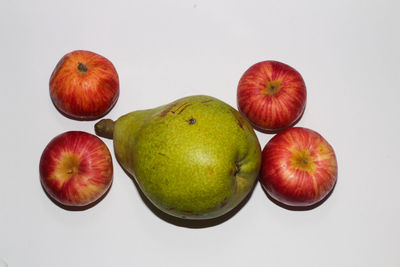 Directly above shot of apples on white background