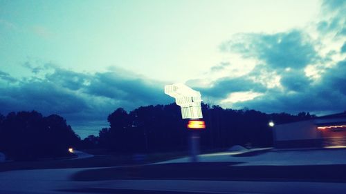 View of road against cloudy sky