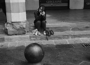 Woman sitting on floor