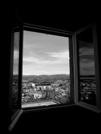 Cityscape seen through window